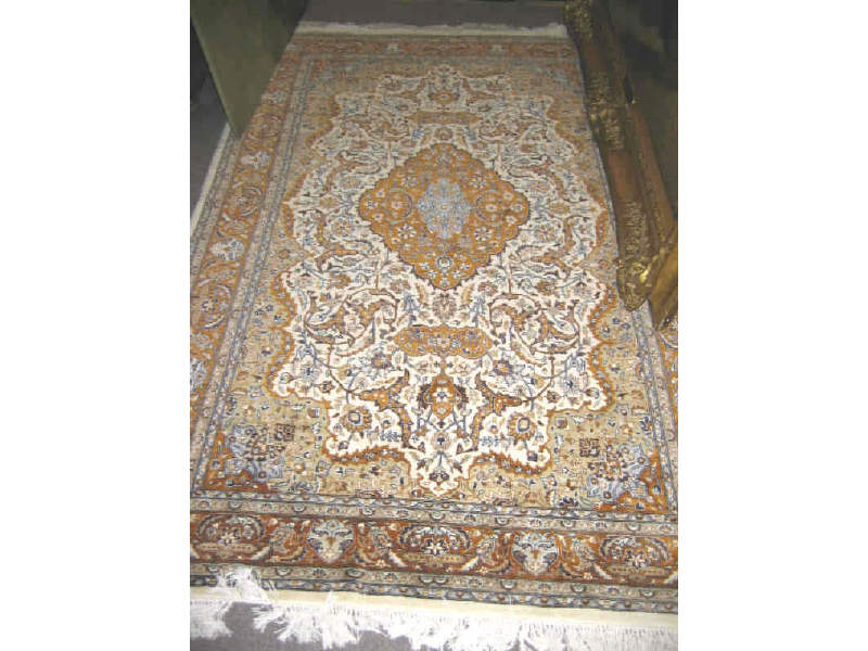 Appraisal: PERSIAN DESIGN THROW RUG The ivory field of floral design