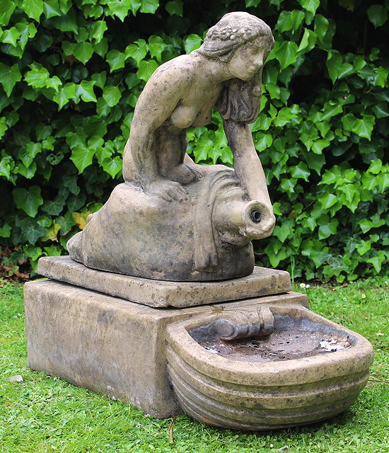 Appraisal: AN ENGLISH CAST COMPOSITE STONE GARDEN FOUNTAIN after a th