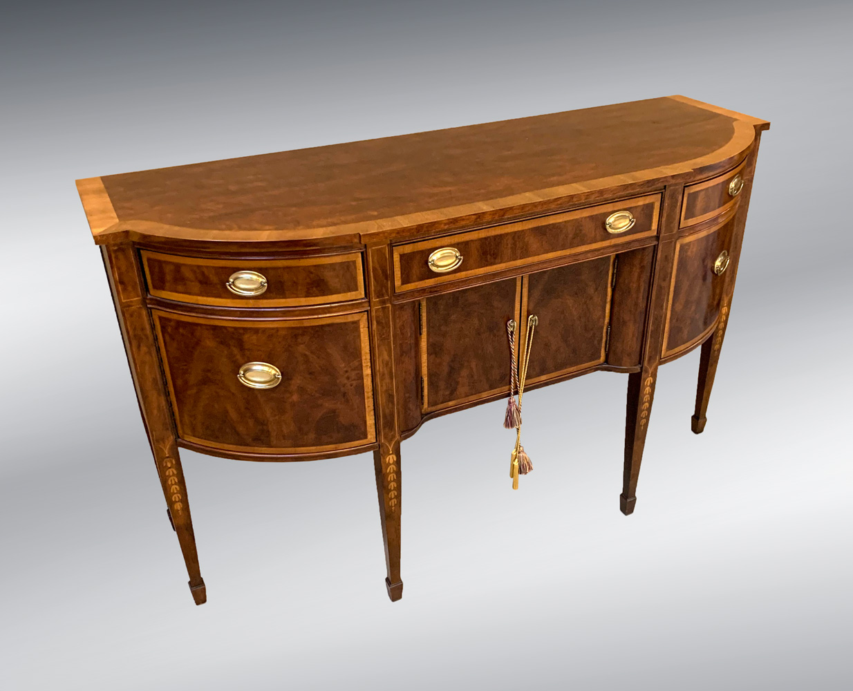 Appraisal: BANDED MAHOGANY HEPPLEWHITE SIDEBOARD drawer over door banded mahogany Hepplewhite