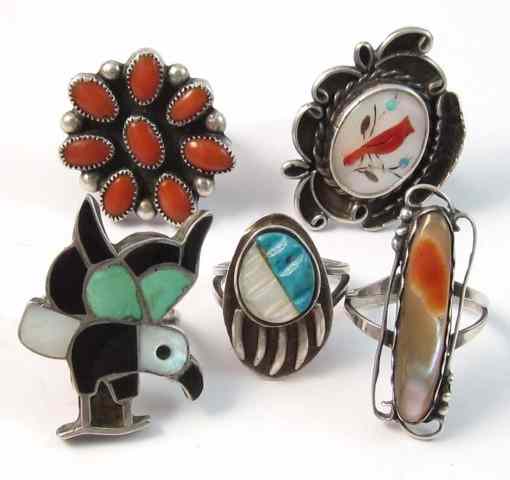 Appraisal: FIVE SOUTHWEST NATIVE AMERICAN SILVER RINGS set with agate red