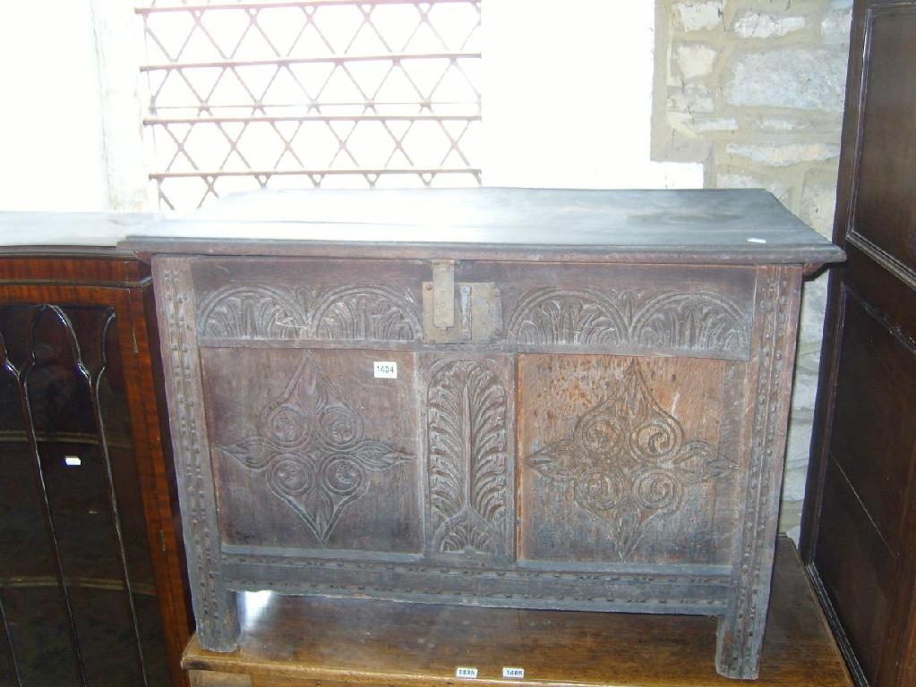 Appraisal: A small th century oak coffer with rising lid the