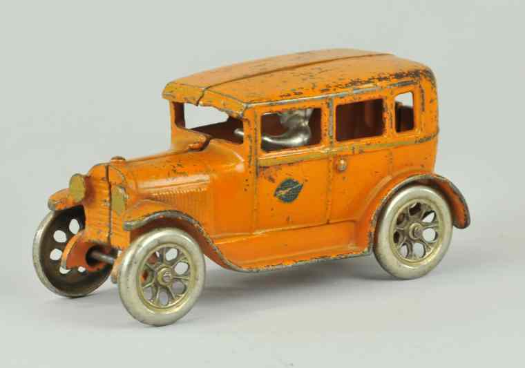 Appraisal: FORD FORDOR SEDAN Arcade cast iron painted in orange overall