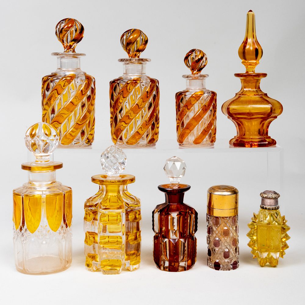 Appraisal: Group of Amber Glass Scent Bottles Comprising A set of