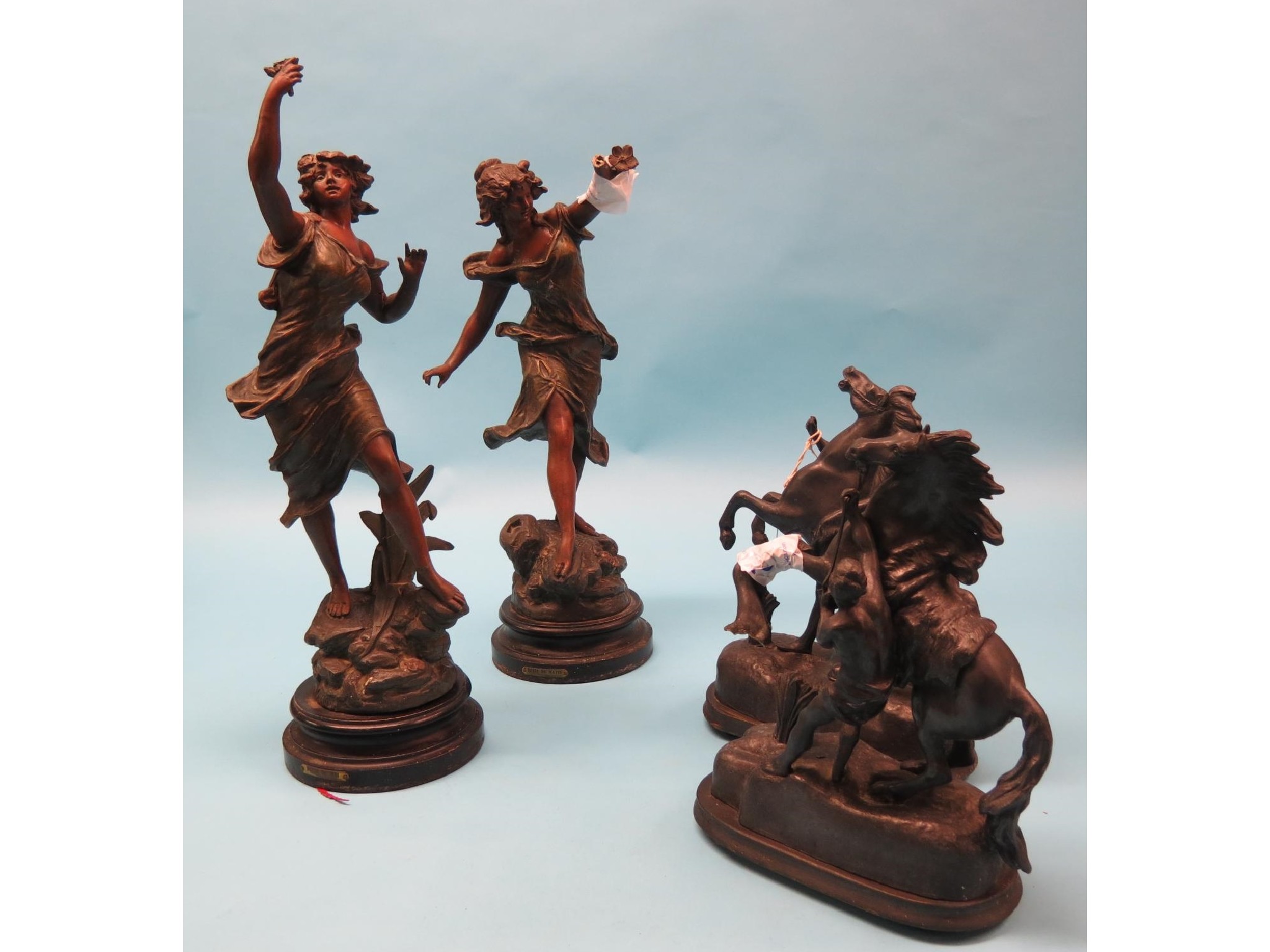 Appraisal: A pair of late th century patinated spelter statuettes after