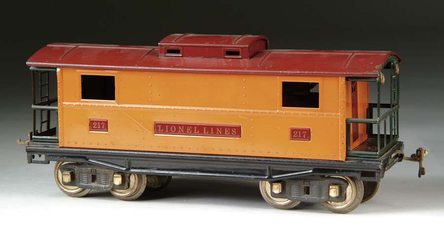 Appraisal: LIONEL STANDARD GAUGE CABOOSE In orange and maroon car has