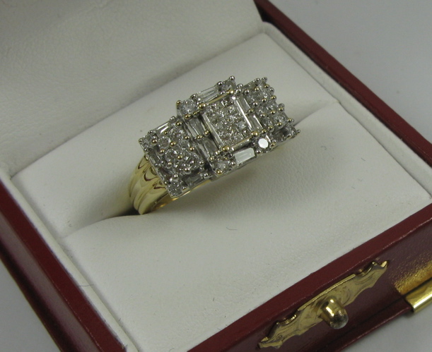 Appraisal: DIAMOND AND K WHITE AND YELLOW GOLD RING set with