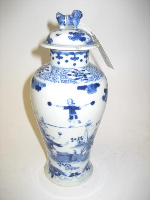 Appraisal: A CHINESE PORCELAIN VASE AND COVER of inverted baluster form