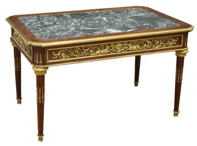 Appraisal: French Louis XVI style ormolu-mounted mahogany table in the manner