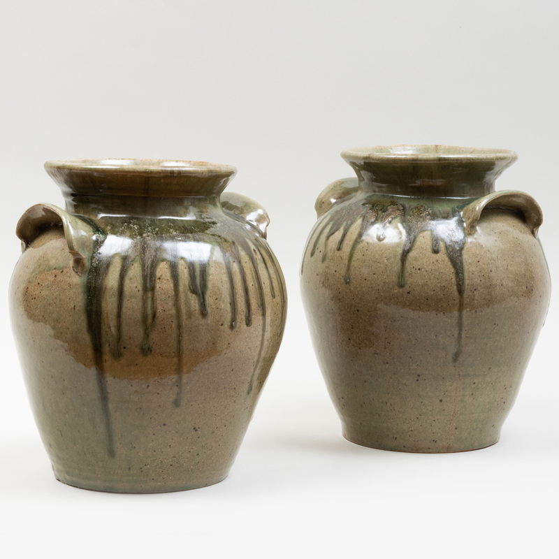 Appraisal: PAIR OF LARGE STUDIO GREEN GLAZED POTTERY JARS Dated x