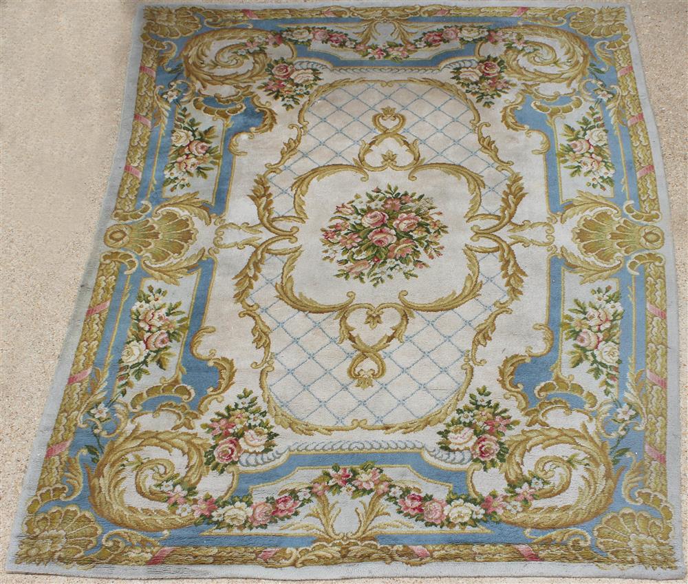 Appraisal: LARGE AUBUSSON STYLE PILE WOOL RUG machine made central floral