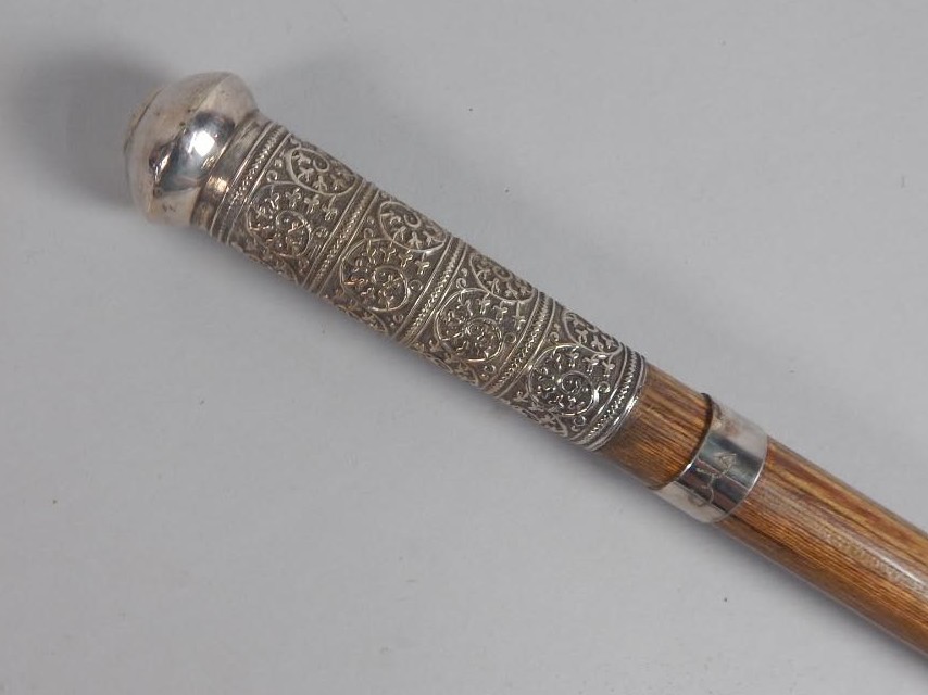 Appraisal: An early thC Indian walking stick with white metal mounts