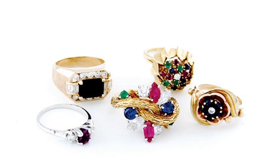 Appraisal: Gemstone and gold rings gemstone ring set with two marquise-cut