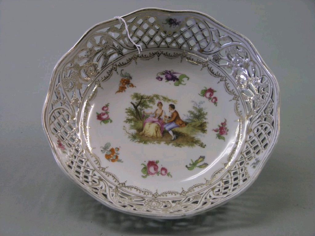 Appraisal: A German porcelain bowl with broad pierced border centre printed