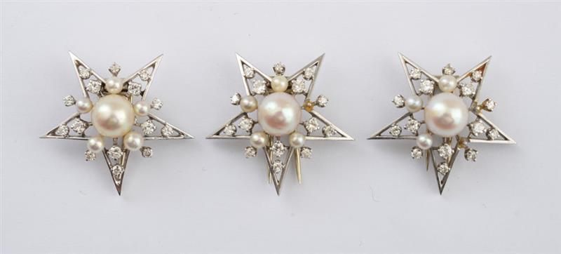 Appraisal: THREE PLATINUM DIAMOND AND CULTURED PEARL STAR PINS Openwork stars