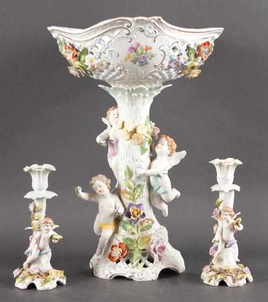 Appraisal: German floral painted porcelain figural centerpiece Carl Thieme Saxony and