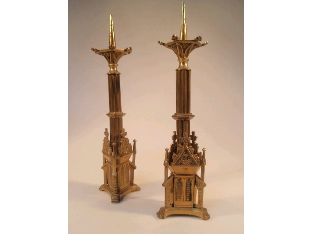 Appraisal: A pair of gilt brass pricket candlesticks of ecclesiastical design