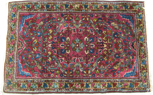 Appraisal: SEMI-ANTIQUE PERSIAN DERGAZINE MAT Sarouk design of flowers on red