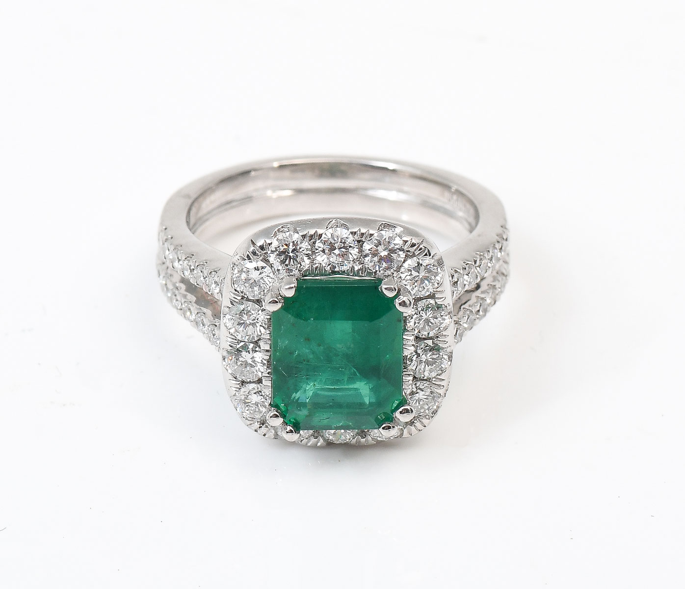 Appraisal: PLATINUM CT EMERALD AND DIAMOND RING CT octagonal step cut