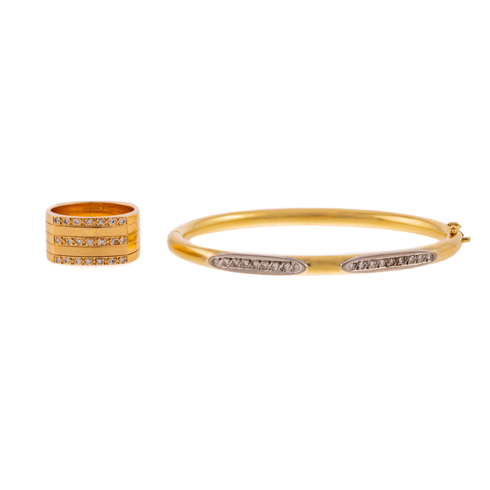 Appraisal: A DIAMOND BANGLE WIDE DIAMOND BAND IN K K yellow