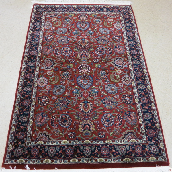 Appraisal: HAND KNOTTED ORIENTAL AREA RUG Indo-Persian overall floral design on