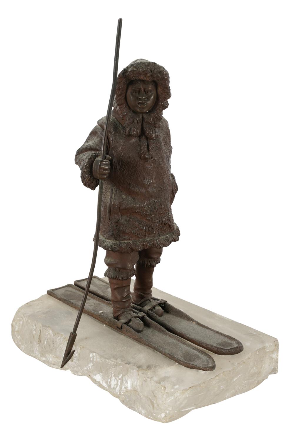 Appraisal: BRONZE FIGUREunsigned depicting an eskimo on snowshoes mounted to a