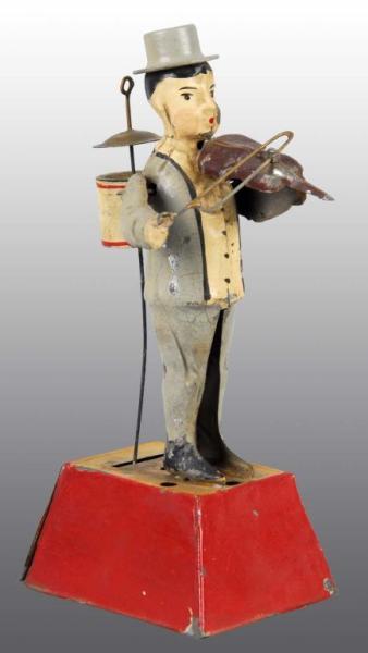 Appraisal: Tin Hand-Painted One Man Band Wind-Up Toy Description German Working