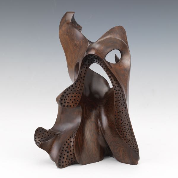 Appraisal: RAY MUNIAK AMERICAN CONTEMPORARY x Abstract carved wood sculpture with