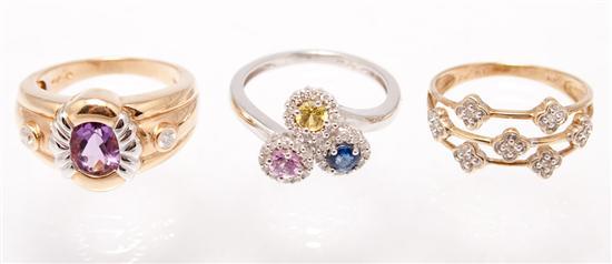 Appraisal: Three gold rings yellow gold diamond and amethyst size white