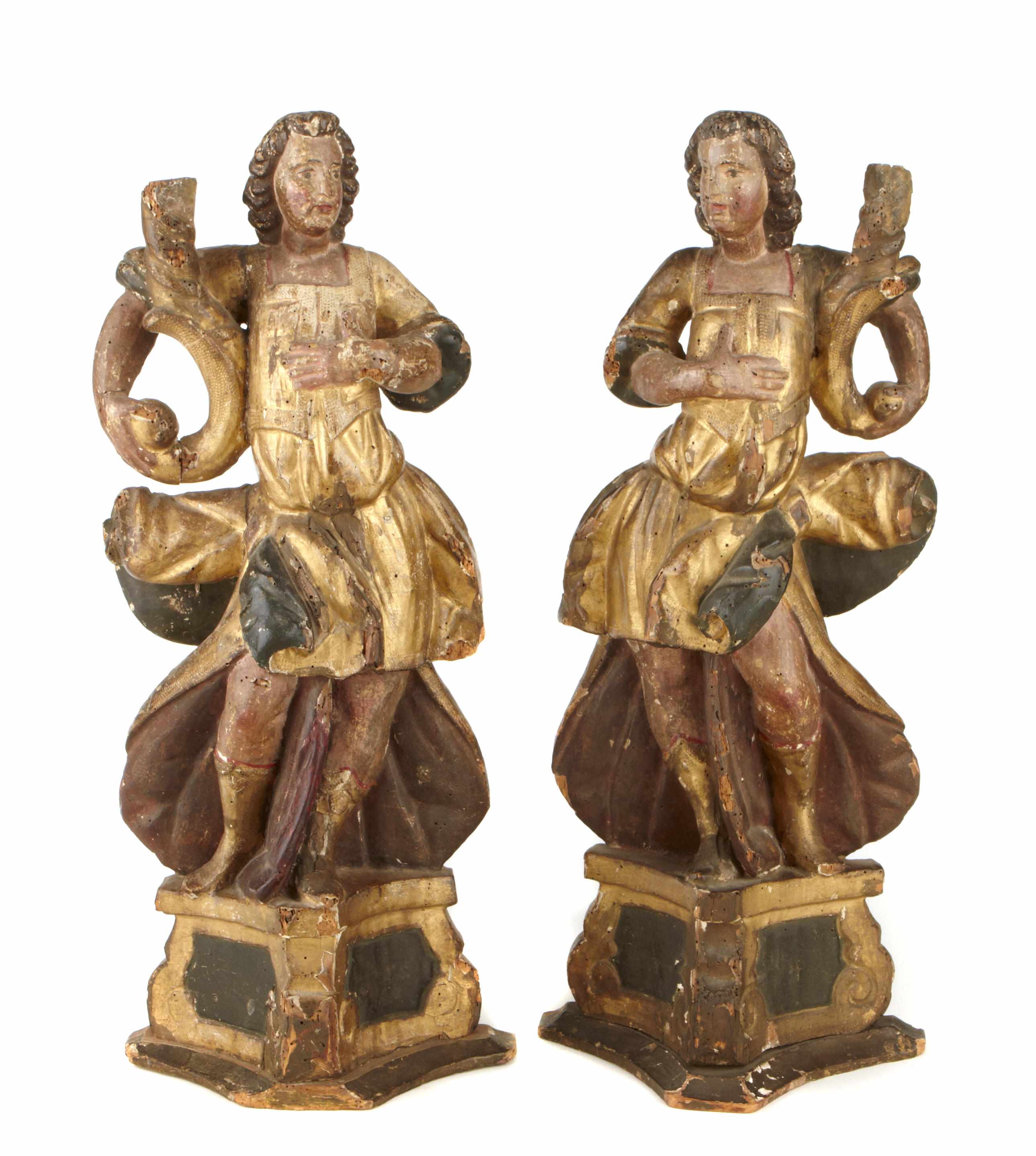 Appraisal: A pair of Continental Baroque parcel gilt paint decorated figures