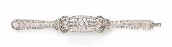 Appraisal: A Platinum and Diamond Bracelet consisting of a central domed