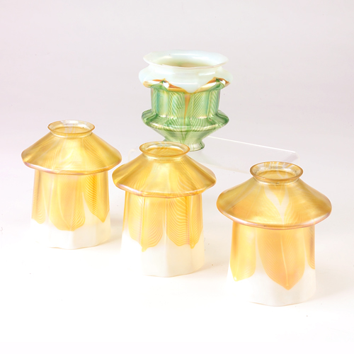 Appraisal: STEUBEN Four glass shades in pulled feather decoration three in