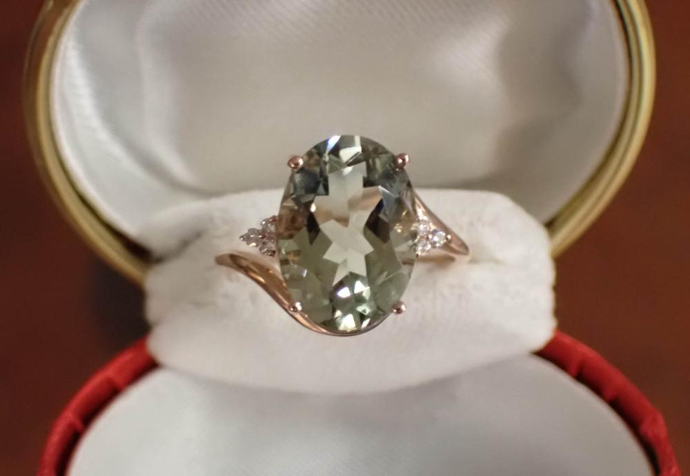 Appraisal: PRASIOLITE DIAMOND AND FOURTEEN KARAT ROSE GOLD RING having three