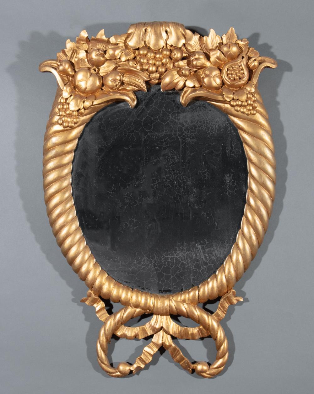 Appraisal: American Classical Giltwood Cornucopia Looking Glass c old oval mirror