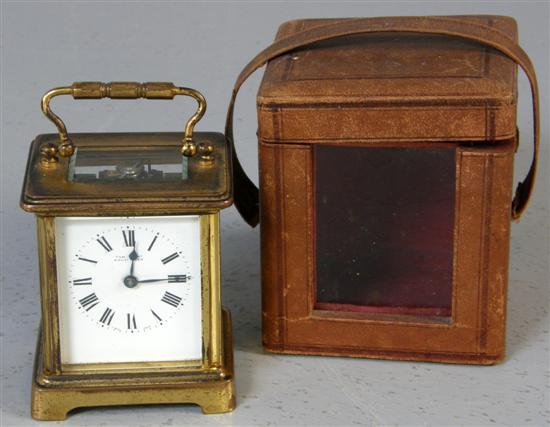 Appraisal: Brass carriage clock in leather case with white enamel dial