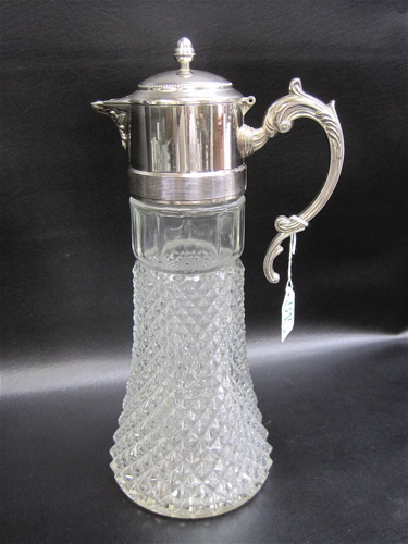 Appraisal: AMERICAN SILVER PLATED GLASS CLARET JUG with clear pattern glass