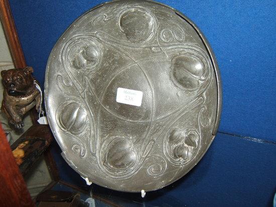 Appraisal: A Tudric pewter charger possibly by Archibald Knox diameter