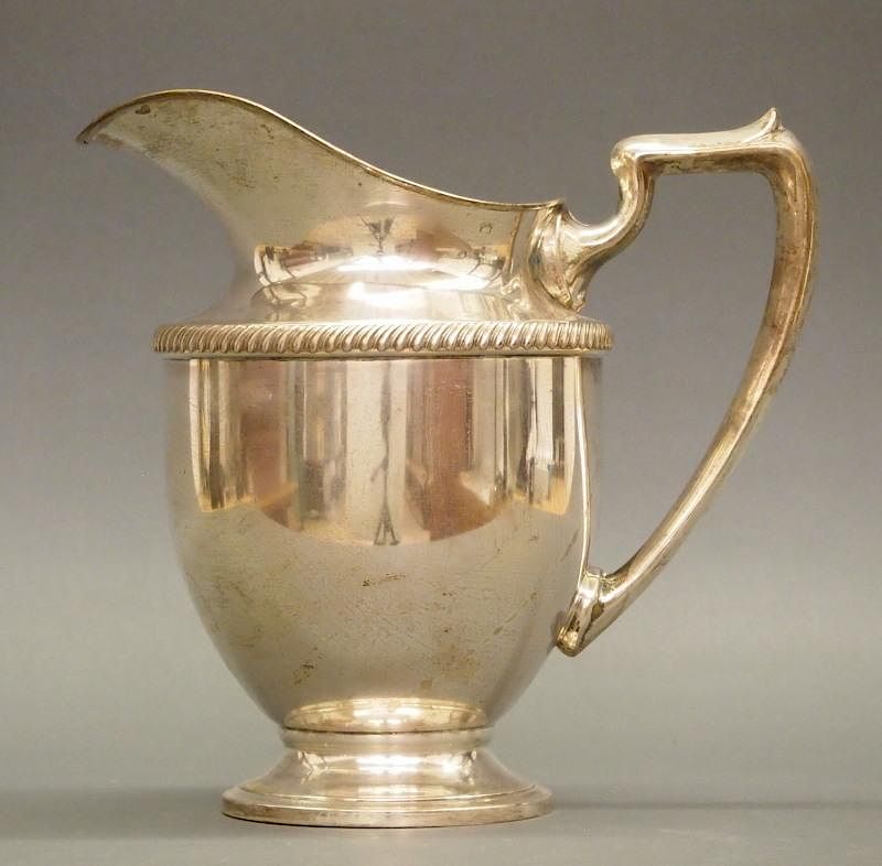 Appraisal: Fisher Sterling water pitcher A mid th century American Sterling