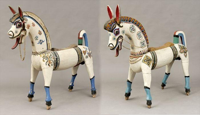 Appraisal: Two Indonesian Polychrome Carved Wood Horse Figures to x to