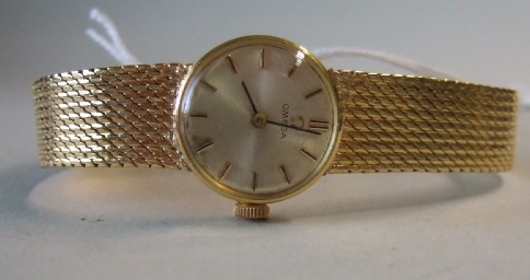 Appraisal: A lady's ct gold Omega bracelet wristwatch the signed circular