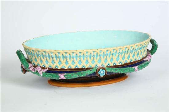 Appraisal: WEDGWOOD MAJOLICA CENTER BOWL Garland and pink ribbons with a