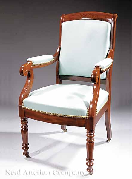 Appraisal: An American Classical Carved Mahogany Library Armchair c - scrolled