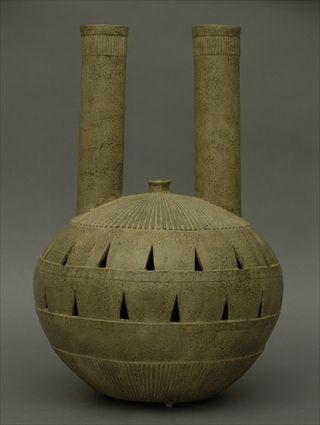 Appraisal: Chinese Warring States-Style Tan-Glazed Twin-Neck Vessel in x in diam