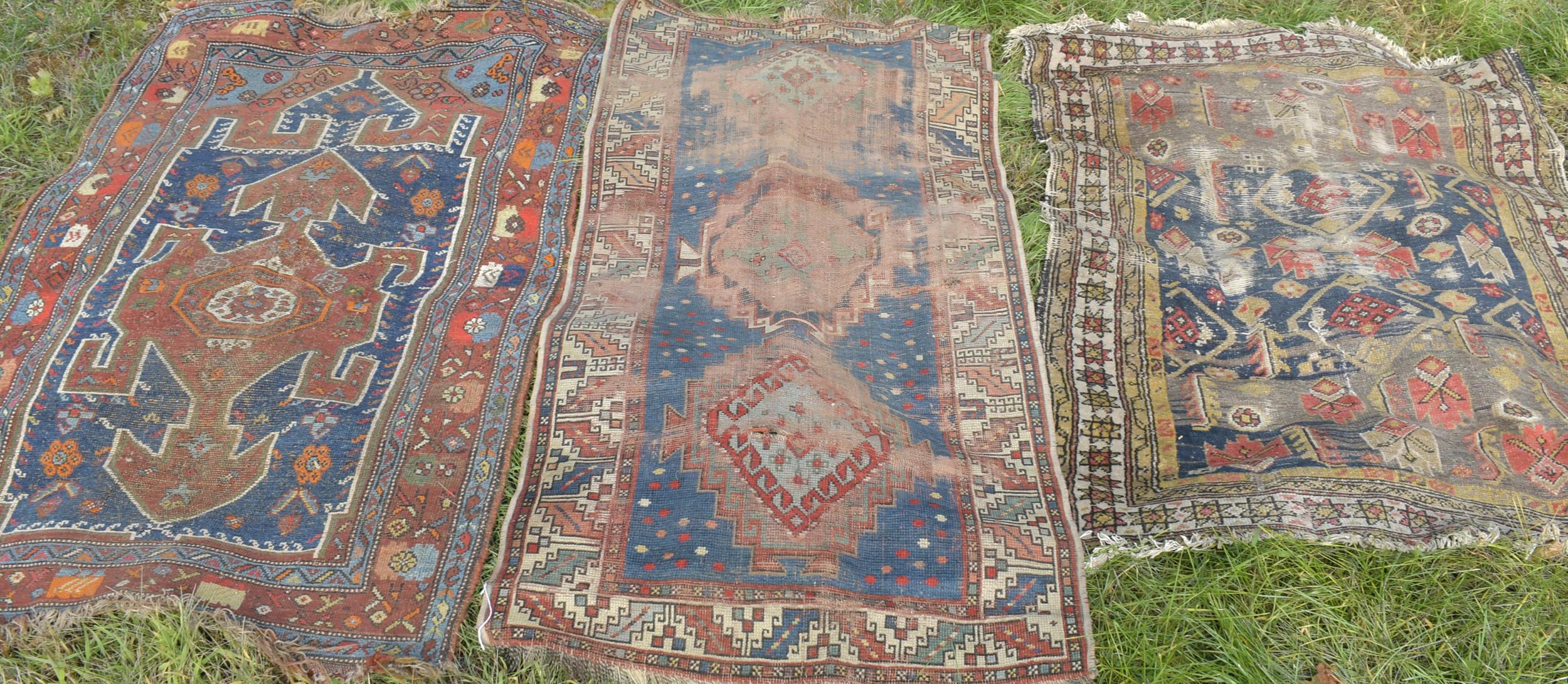 Appraisal: THREE ANTIQUE WORN SCATTER RUGS Three heavily worn antique Oriental