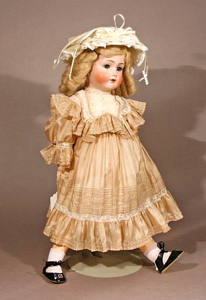 Appraisal: A German bisque-head doll incised K R Simon amp Halbig