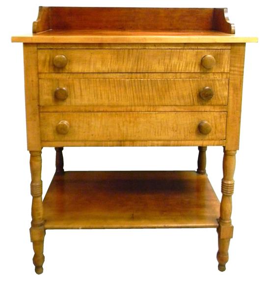 Appraisal: th C American Sheraton tall stand with figured maple front