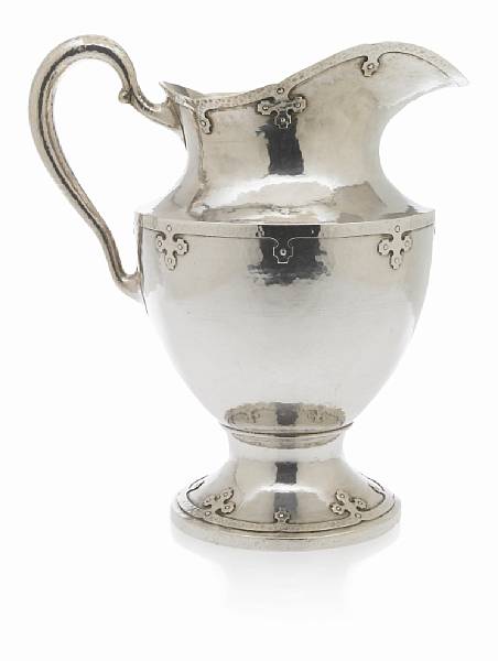 Appraisal: An Arts amp Crafts sterling hand-wrought water pitcher retailed by