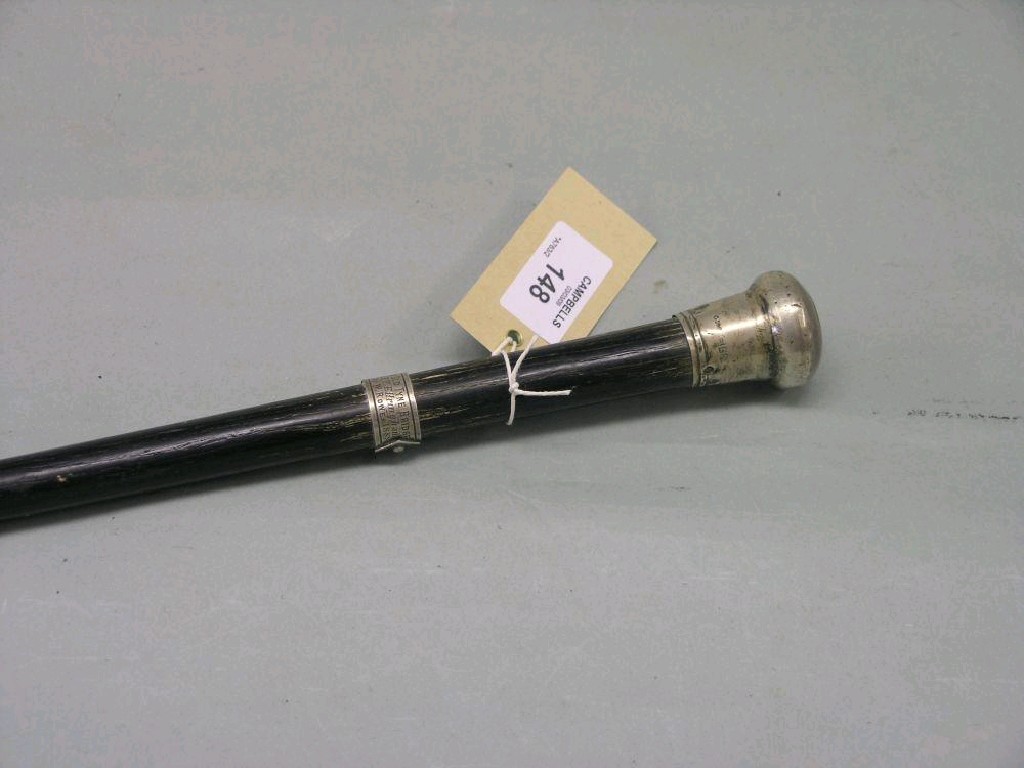 Appraisal: A late Victorian ebonised and silver mounted walking cane silver