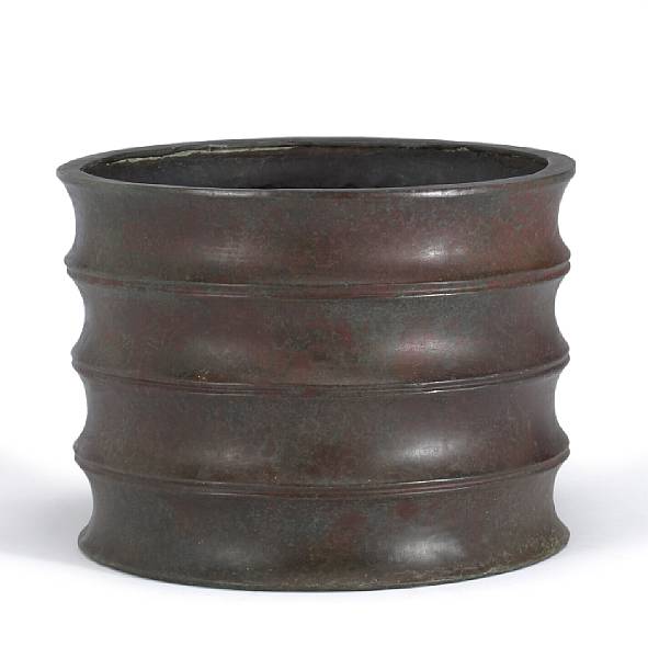 Appraisal: A Chinese bronze ribbed faux bamboo hibachi Of cylindrical form