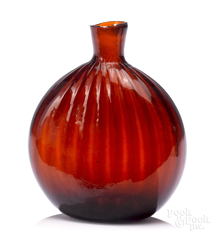 Appraisal: Zanesville pattern molded amber glass flask Zanesville half pint pattern