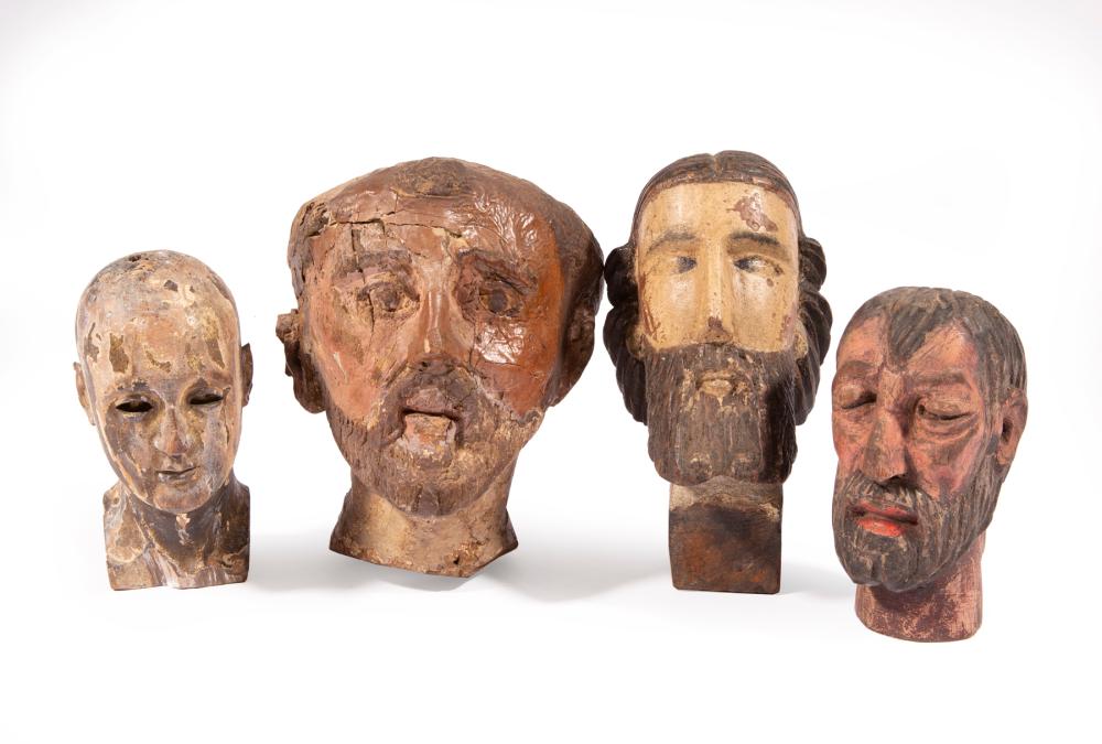 Appraisal: Four Antique Carved and Painted Wood Heads bearded tallest h